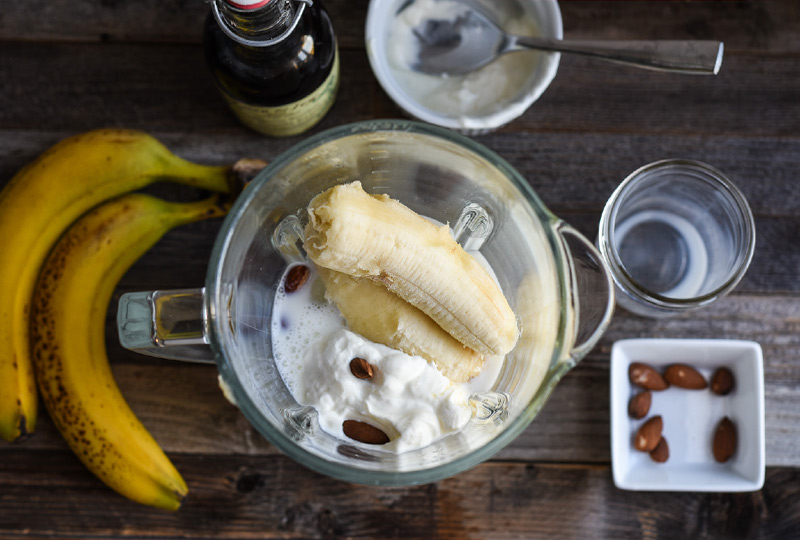 Bananas, yogurt and almonds in a blender