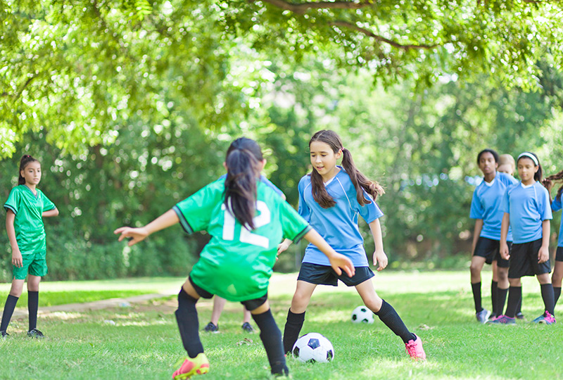 Girls playing soccer