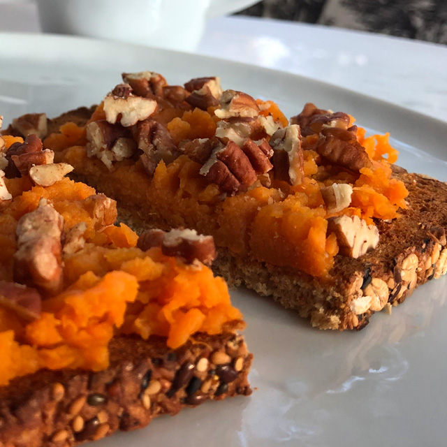 Mashed sweet potatoes on top of toast